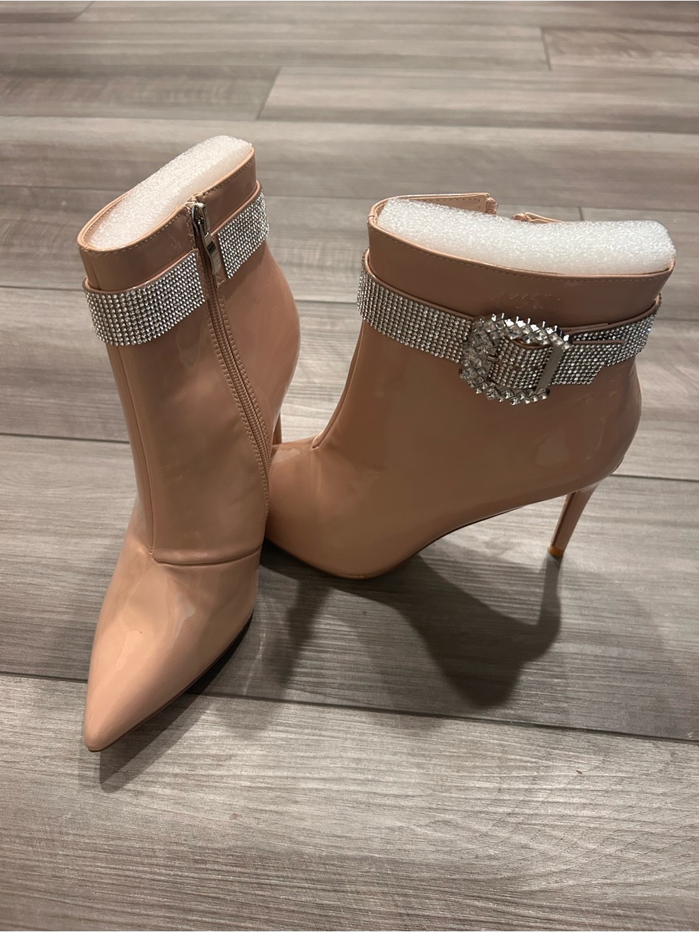 Nude Patent Rhinestone Buckle Ankle Bootie